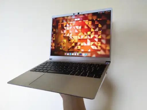 The Framework 13 laptop in the palm of my hand